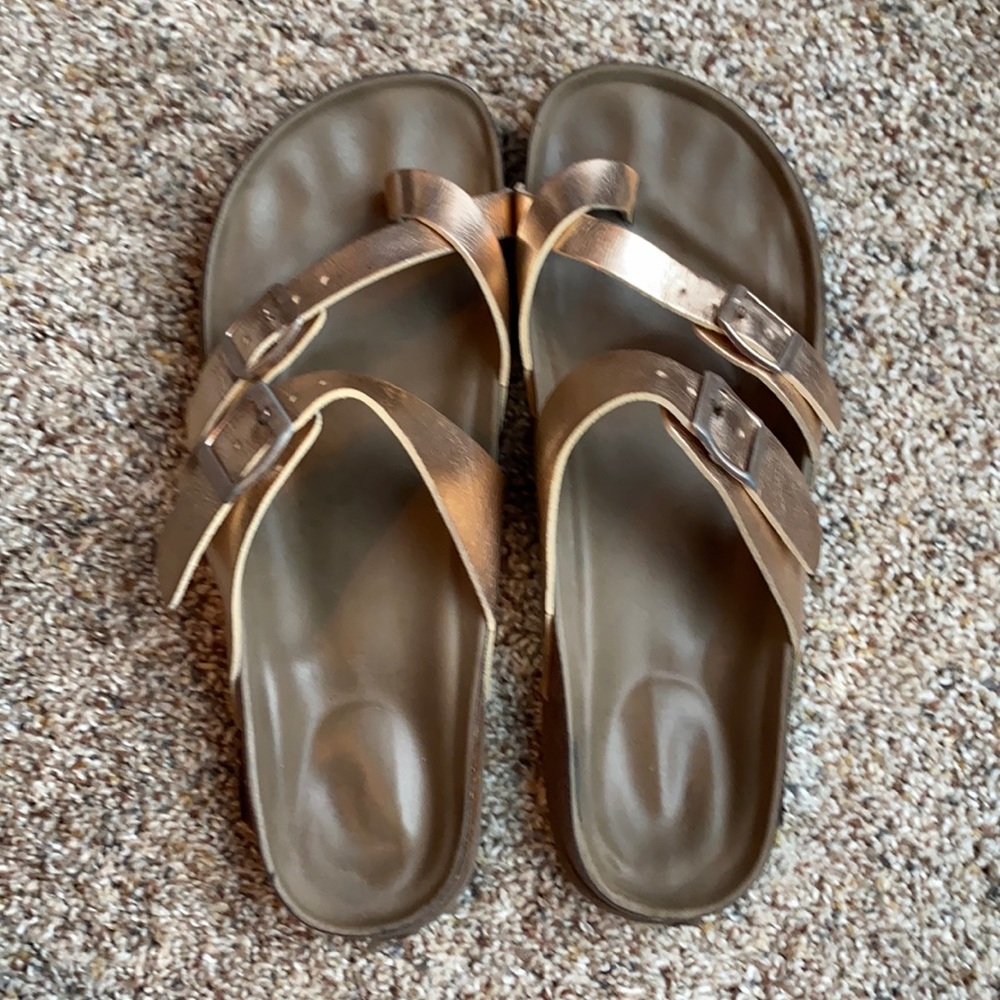 Sam Edelman rose gold Birkenstock sandals.